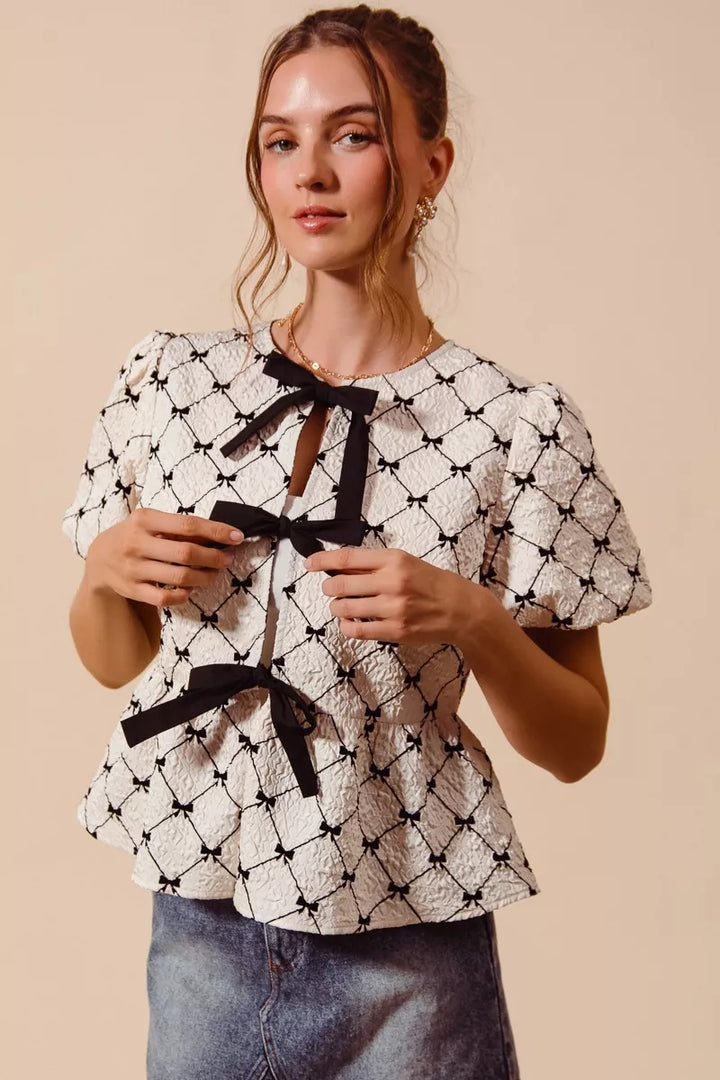 Bow Textured Woven Peplum Top with Contrast Tie